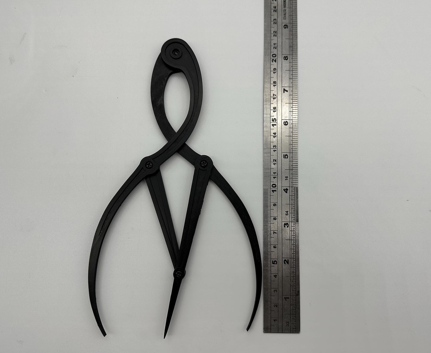 Artist golden ratio caliper for accurate proportional measurement in drawing, painting, and sculpture. Ready to use, worldwide shipping.