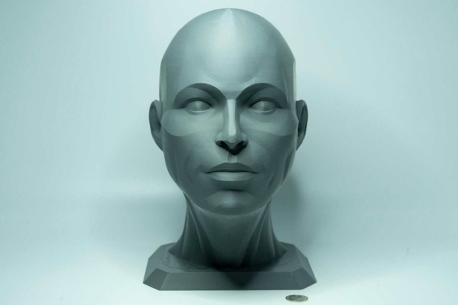 Female planar head sculpture designed for artists. Precision anatomy model for studying facial structure, planes, and value under light.