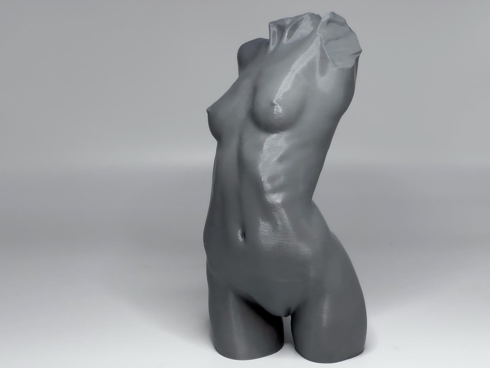 Female figure anatomy model for artists. Studio reference sculpture for studying weight shift, torso structure, and lighting.