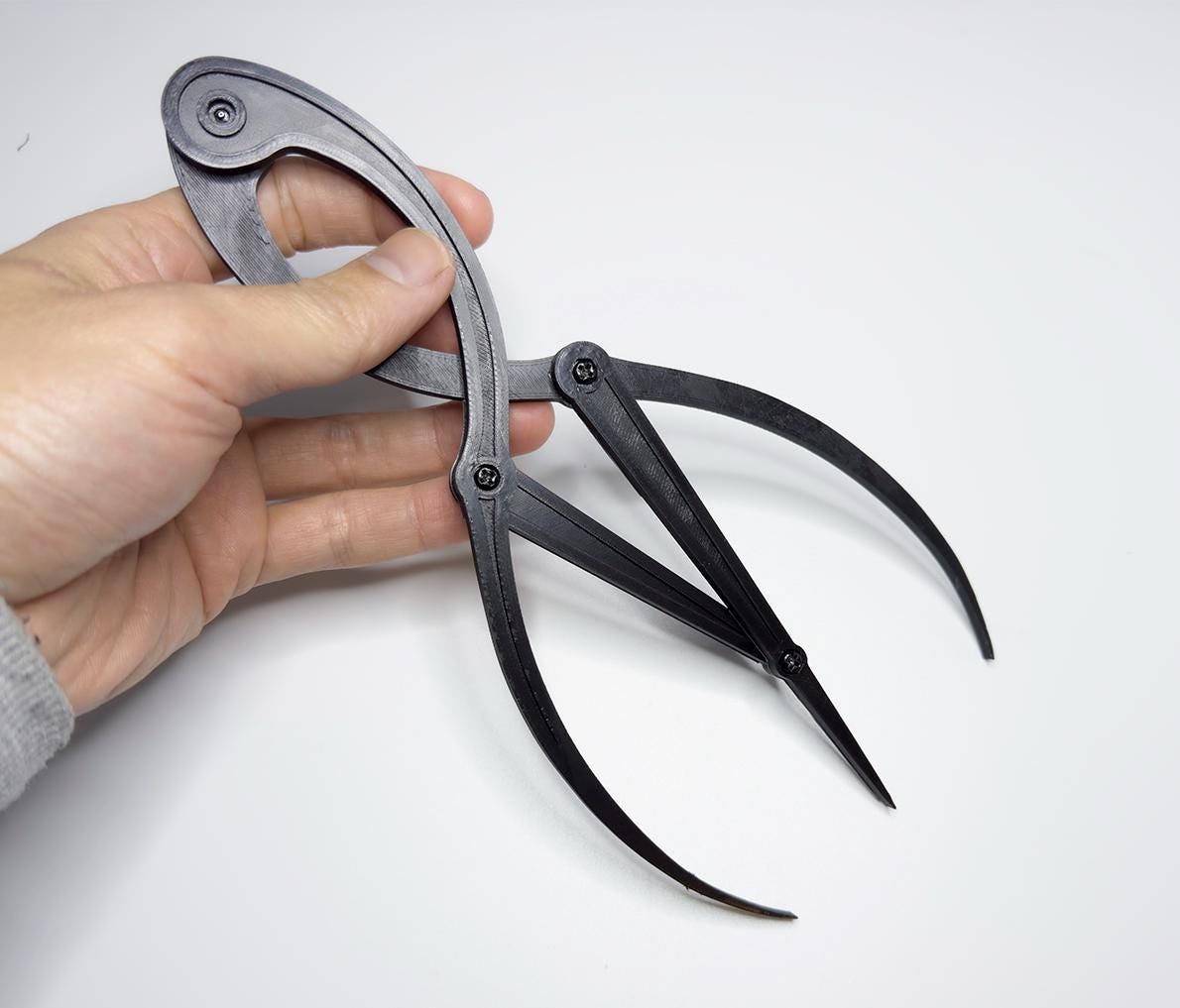 Artist golden ratio caliper for accurate proportional measurement in drawing, painting, and sculpture. Ready to use, worldwide shipping.