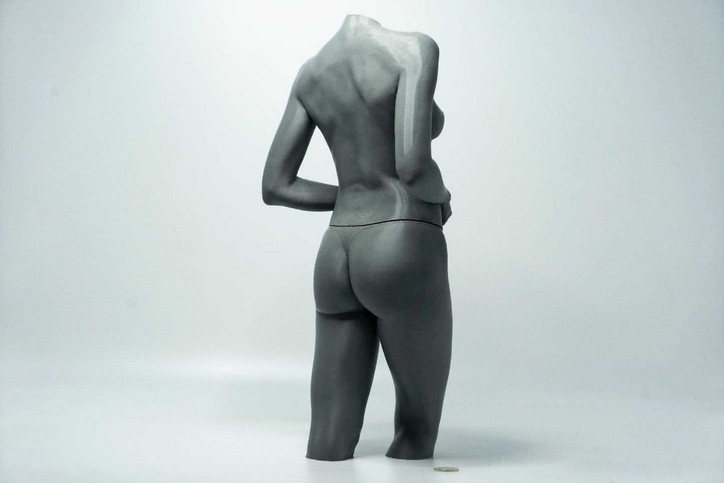 Female standing figure anatomy model for artists. Studio reference sculpture for studying weight shift, posture, and structural form.