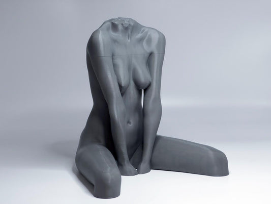Seated female figure sculpture designed for artists studying anatomy, proportion, and grounded poses.