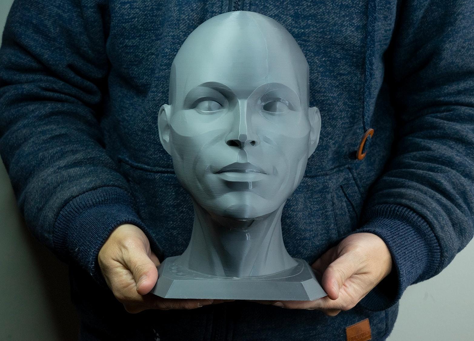 Female planar head sculpture designed for artists. Precision anatomy model for studying facial structure, planes, and value under light.