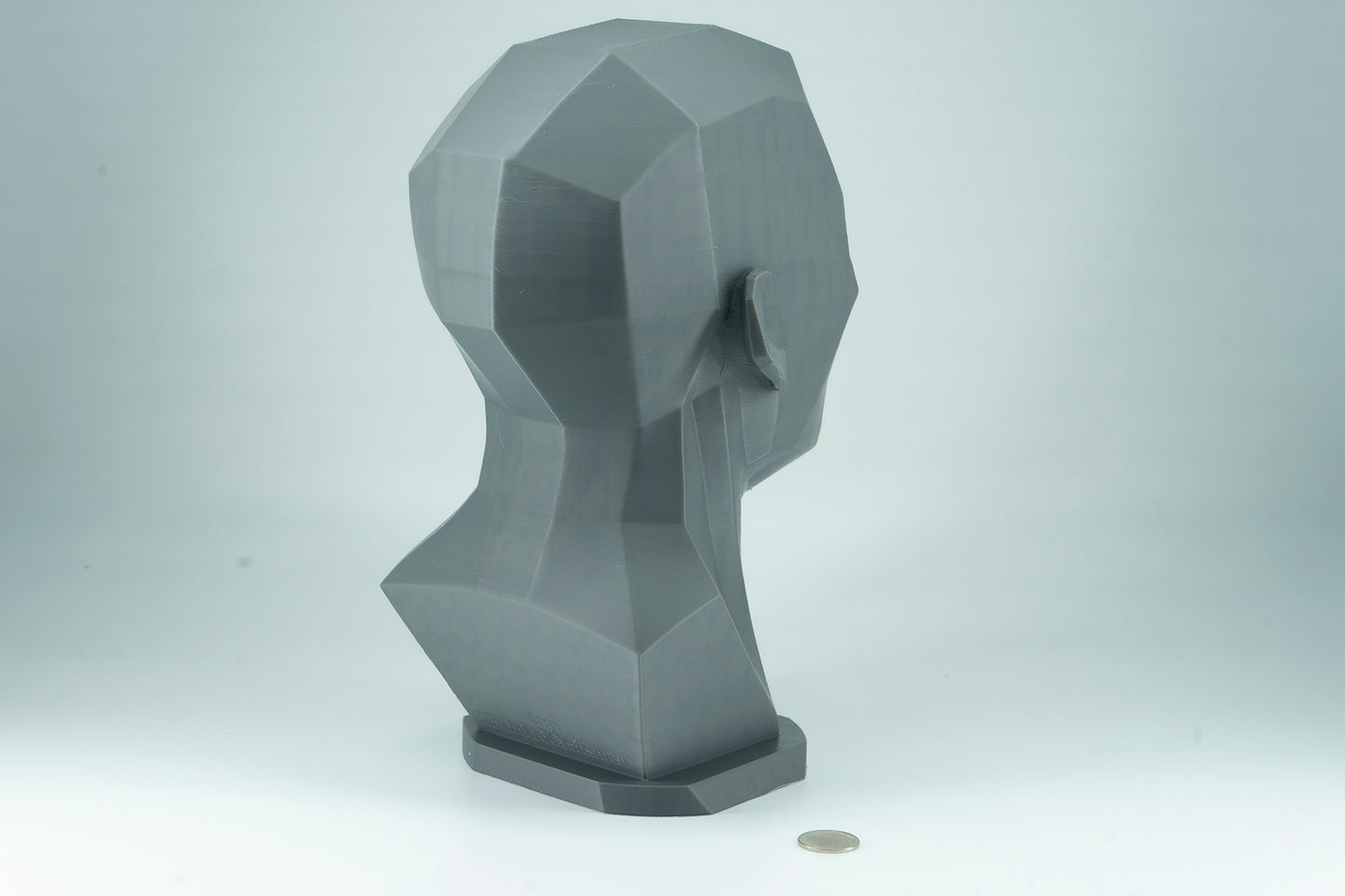 Precision planar head reference tool for artists studying light, value, and facial structure. Made to order in studio-ready sizes.