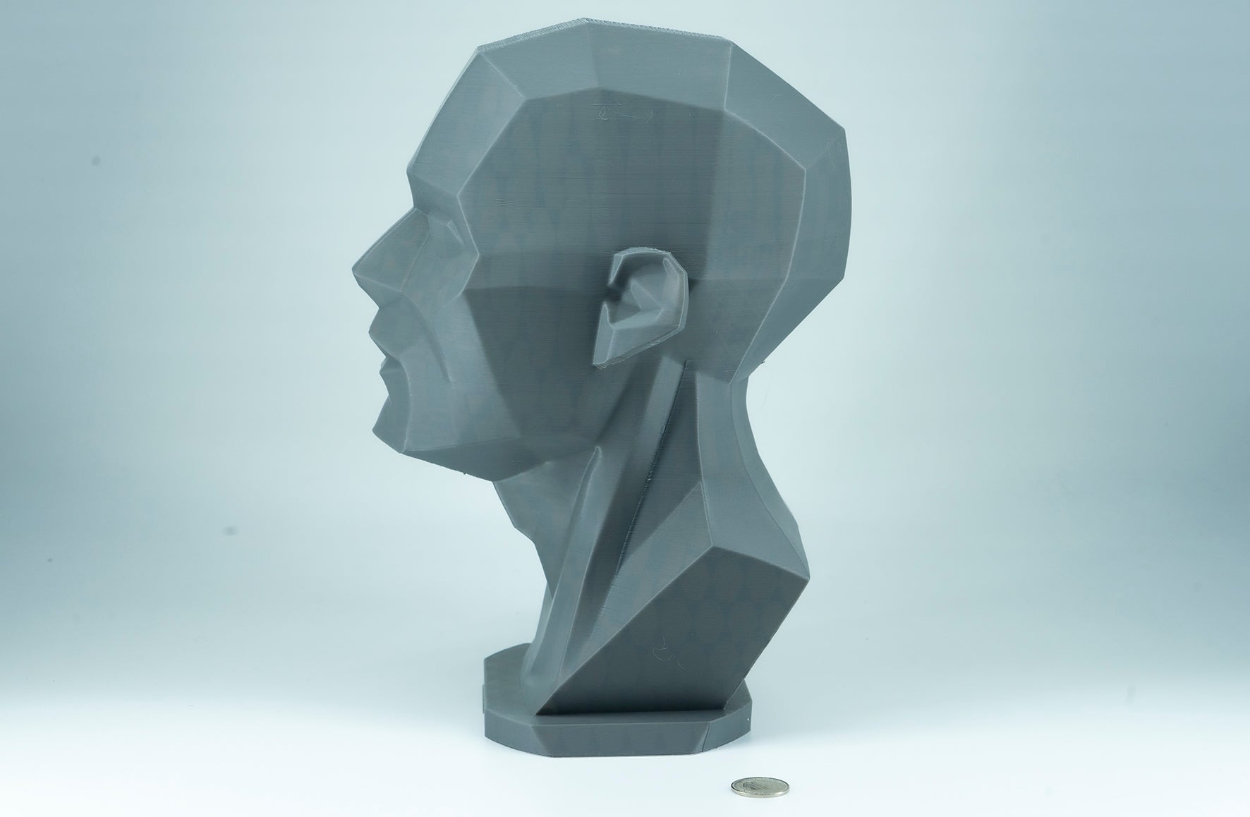 Precision planar head reference tool for artists studying light, value, and facial structure. Made to order in studio-ready sizes.