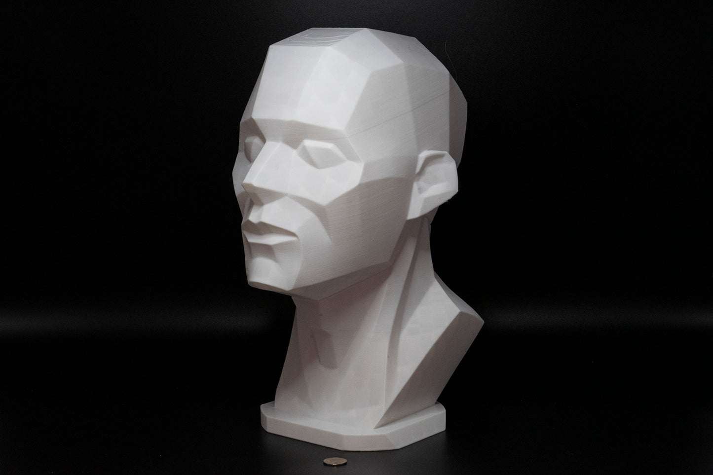 Precision planar head reference tool for artists studying light, value, and facial structure. Made to order in studio-ready sizes.