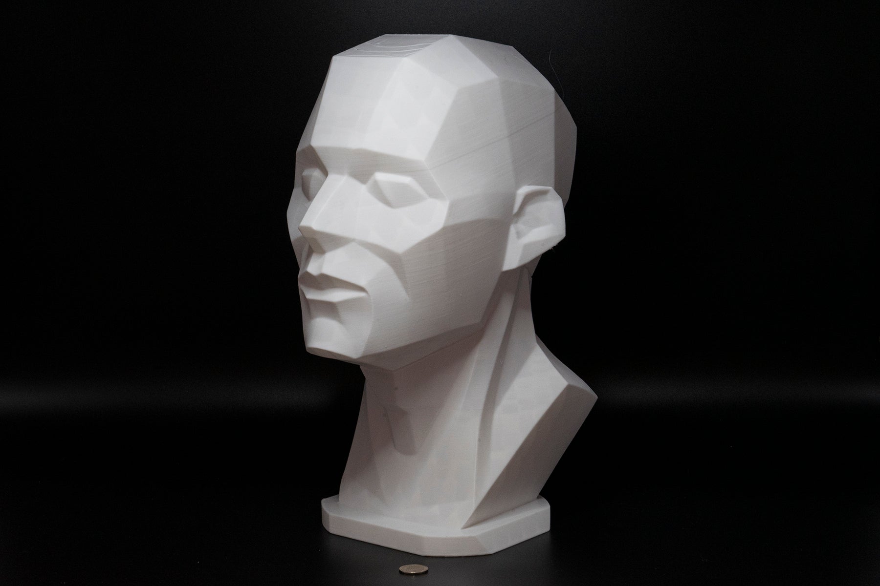 Precision planar head reference tool for artists studying light, value, and facial structure. Made to order in studio-ready sizes.