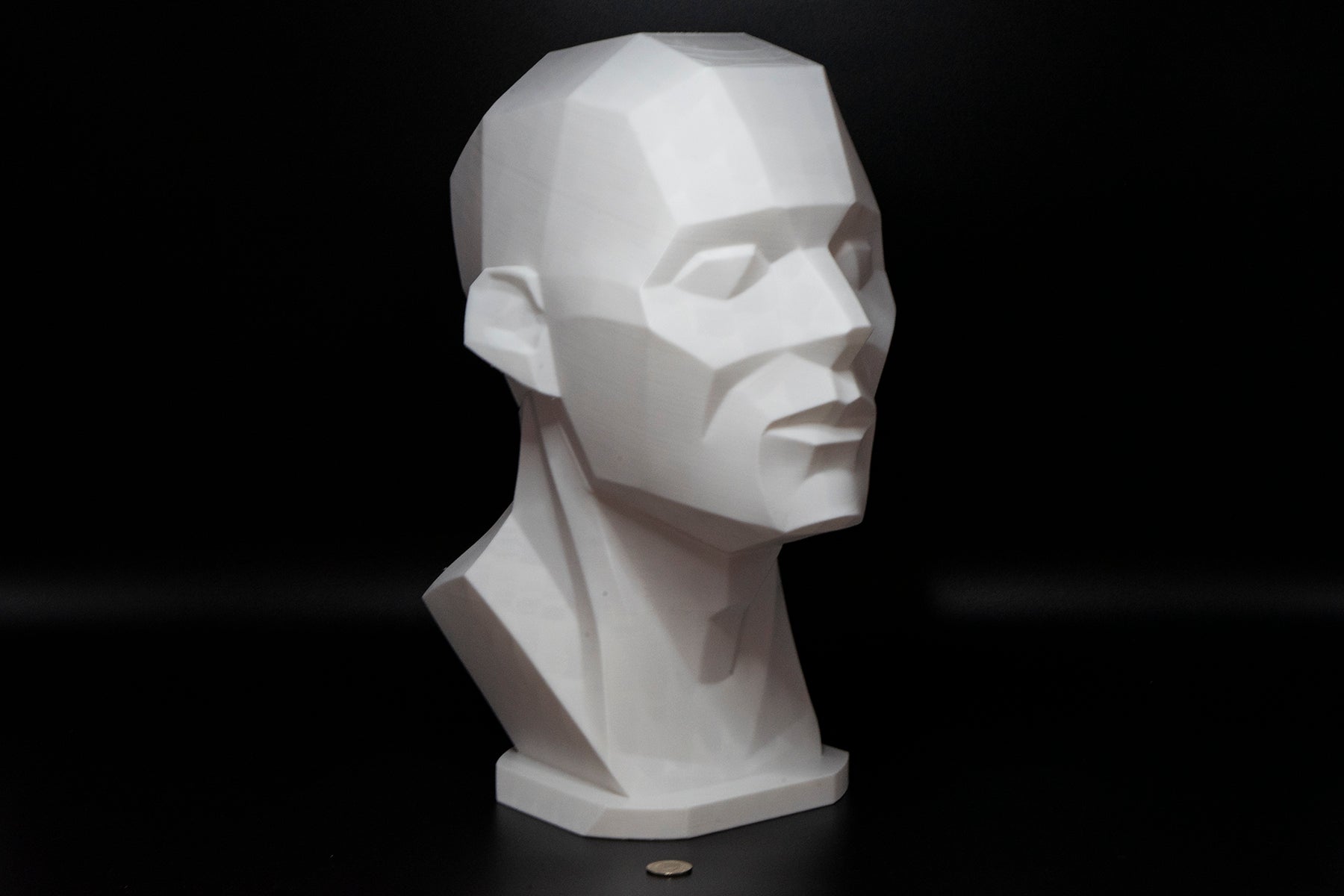 Precision planar head reference tool for artists studying light, value, and facial structure. Made to order in studio-ready sizes.