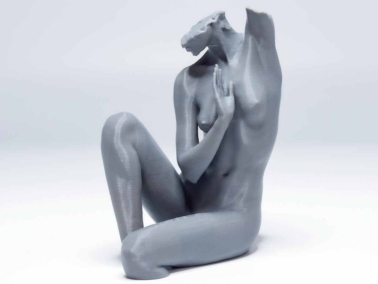 Female seated anatomy sculpture with raised arm for artists. Figure drawing reference model for studying stretch, proportion, and light.