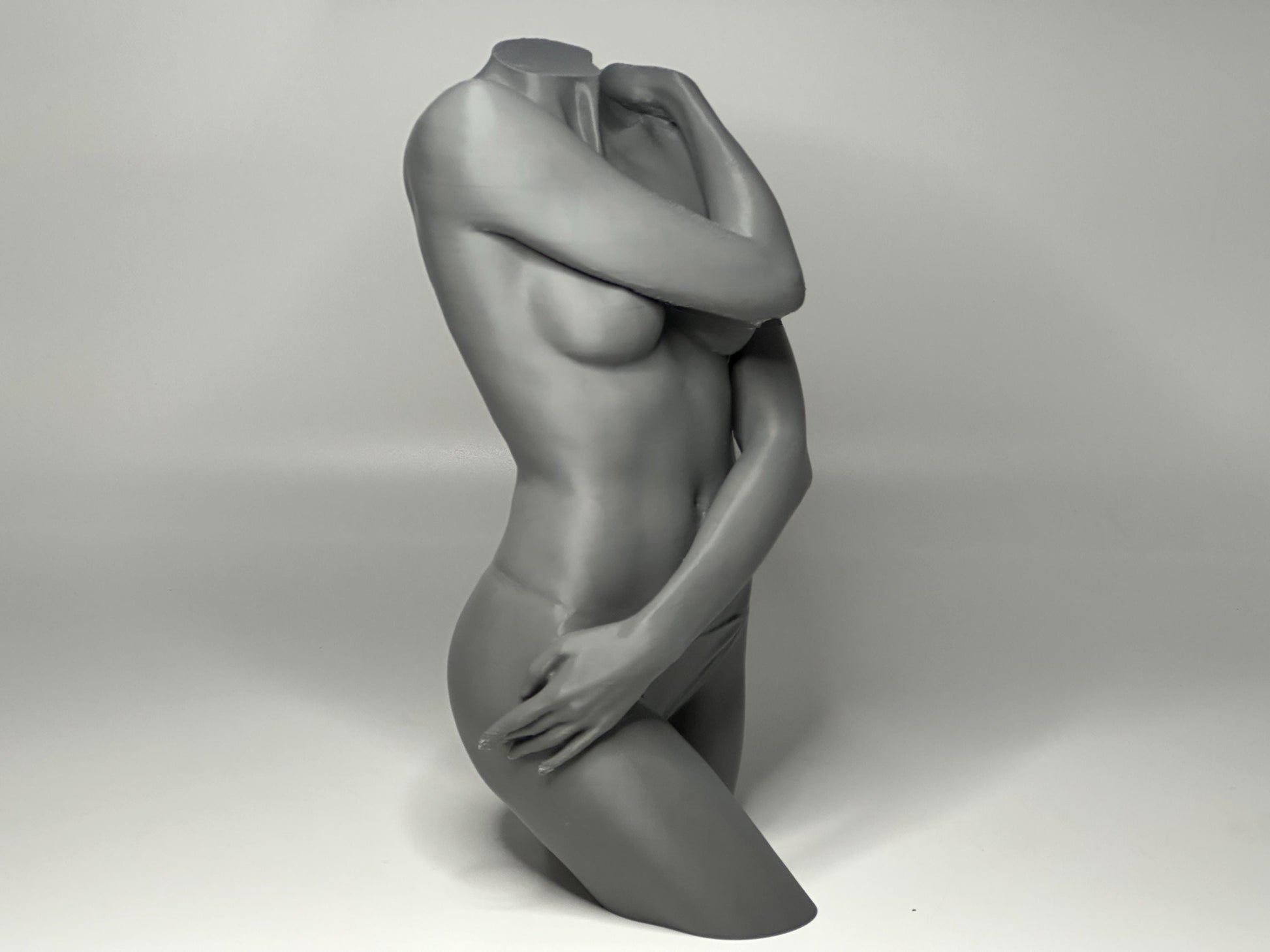 Female seated anatomy torso model for artists. Studio reference sculpture for studying shoulder overlap and structural balance.