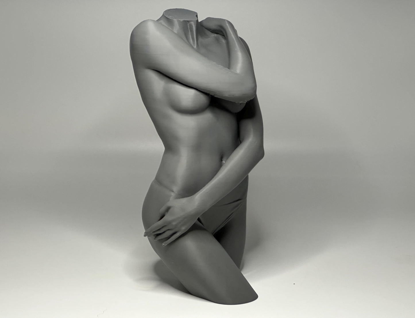 Female seated anatomy torso model for artists. Studio reference sculpture for studying shoulder overlap and structural balance.