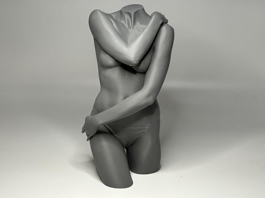 Female seated anatomy torso model for artists. Studio reference sculpture for studying shoulder overlap and structural balance.