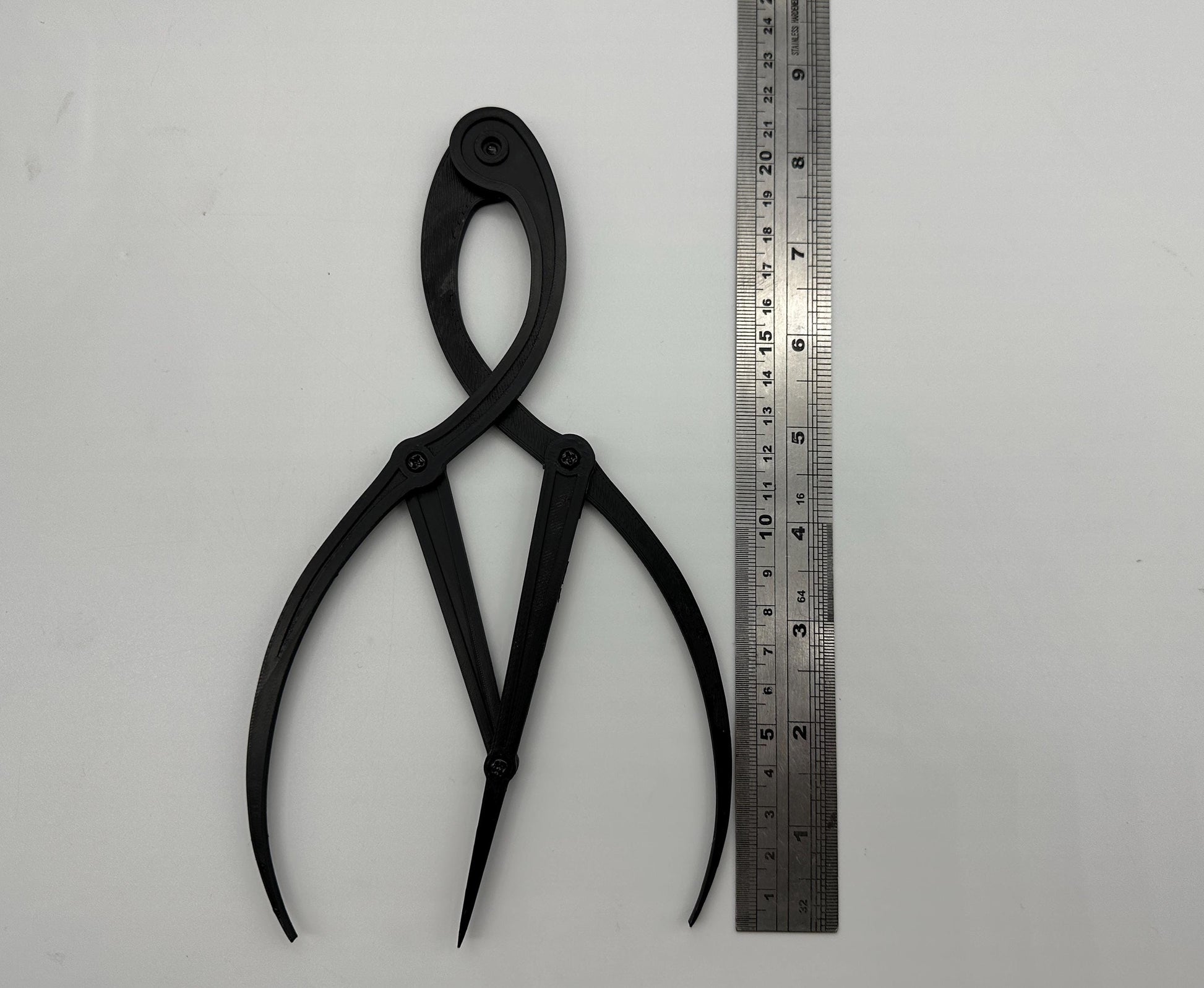 Artist golden ratio caliper for accurate proportional measurement in drawing, painting, and sculpture. Ready to use, worldwide shipping.