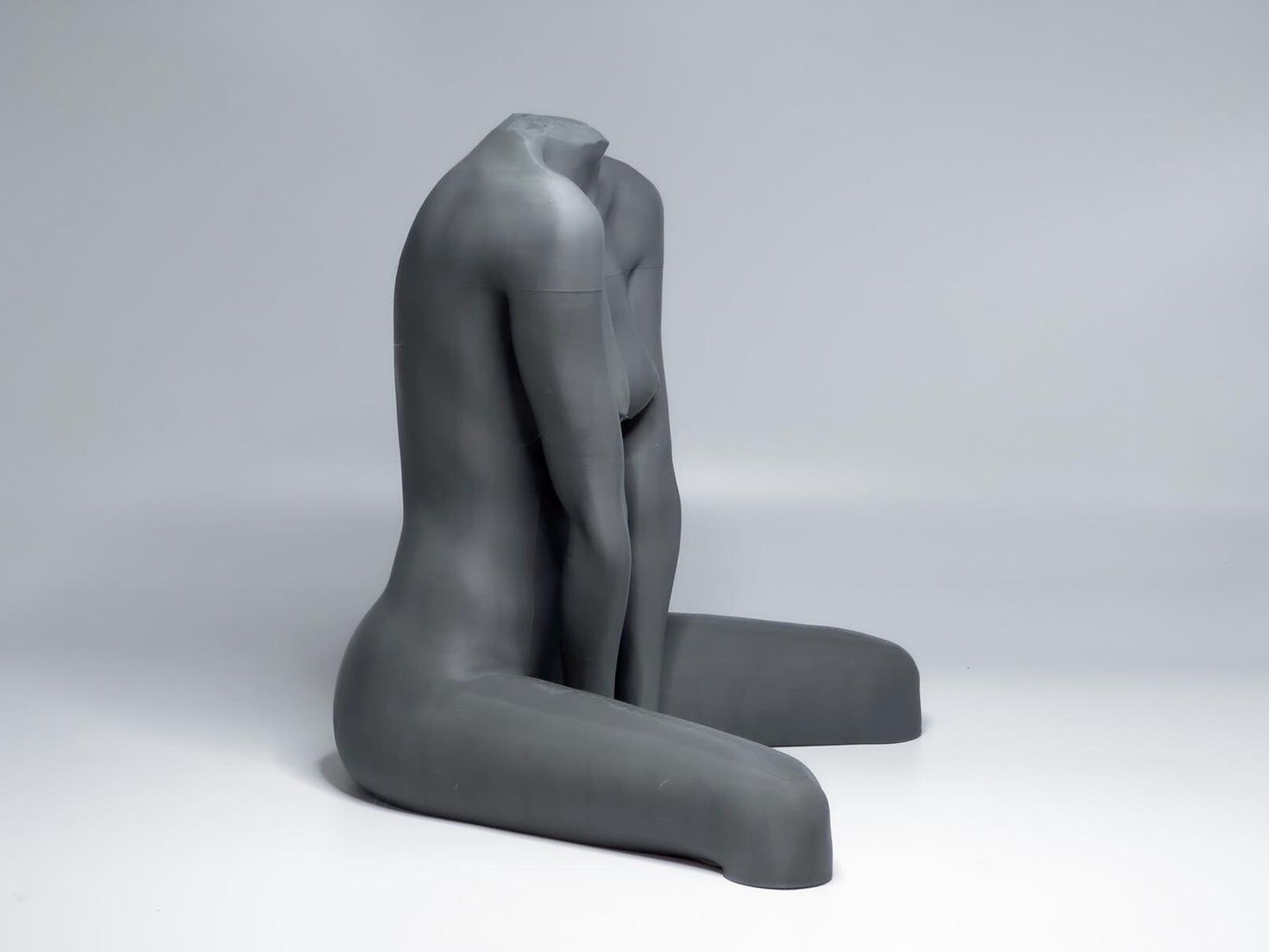 Seated female figure sculpture designed for artists studying anatomy, proportion, and grounded poses.